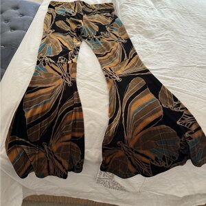 Free People Black Waistband bell bottoms with Earth Tone Print